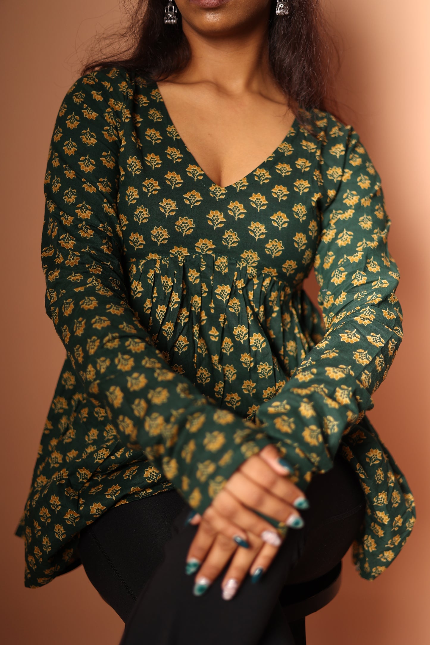 Peplum Top in Bottle green