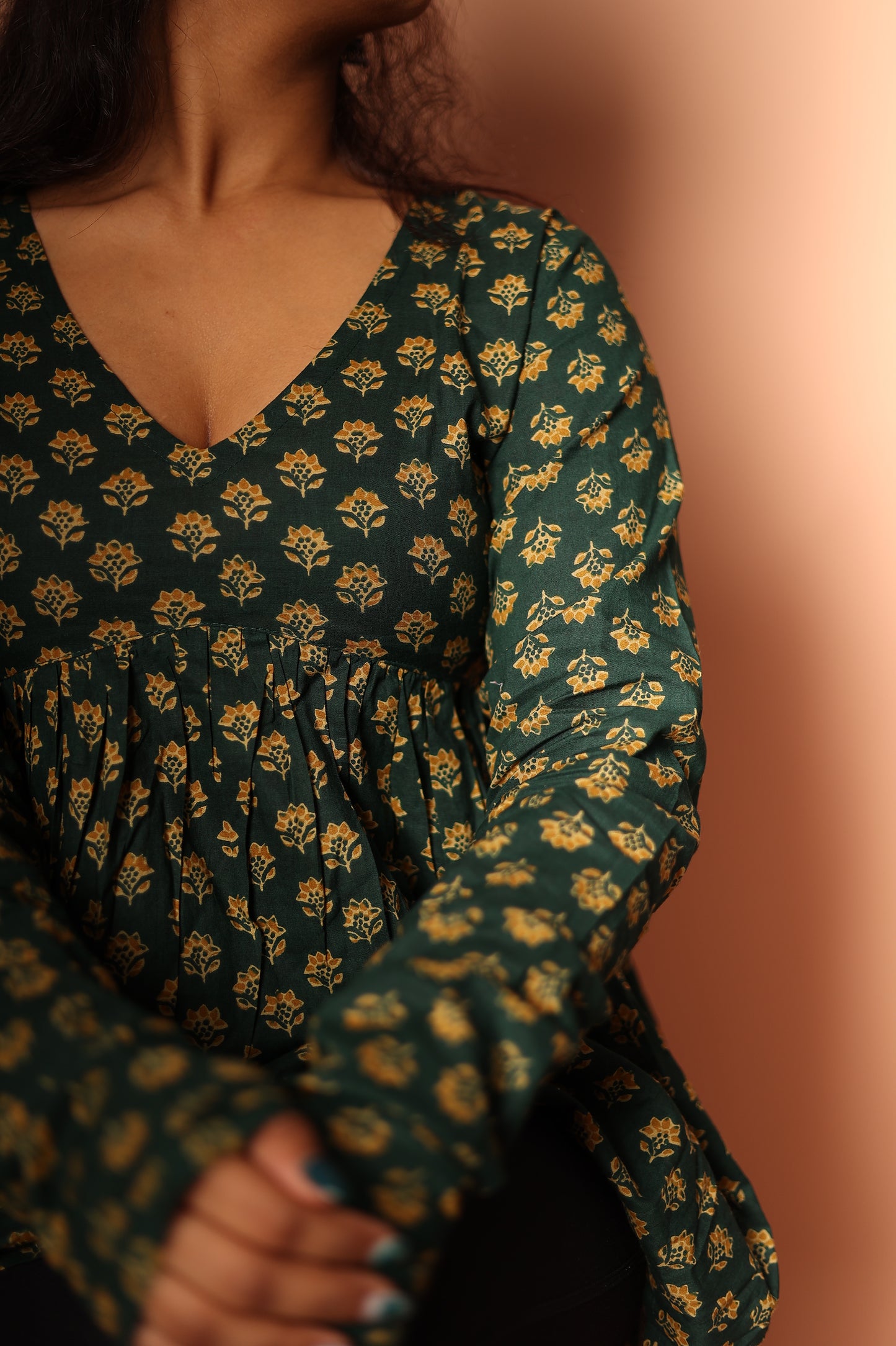 Peplum Top in Bottle green