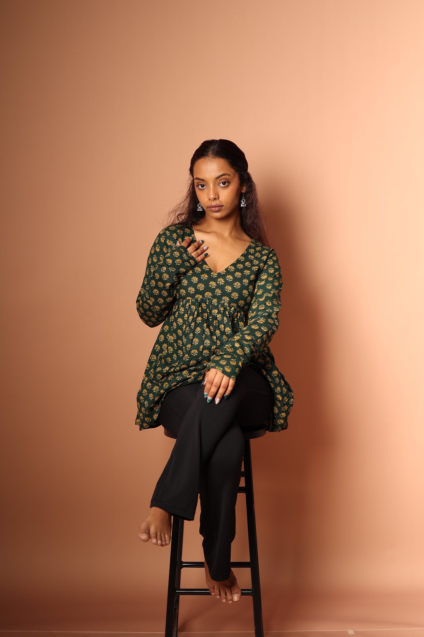 Peplum Top in Bottle green